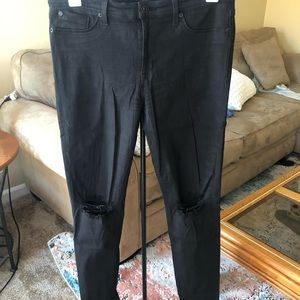 Hudson jean with rip in knees. Mid rise black